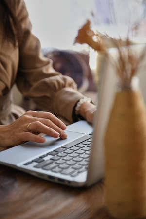 man working on laptop at the tableの写真素材