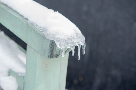 icicle on the railing stairs in spring