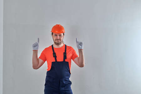 smart worker in white gloves raised his hands upの写真素材