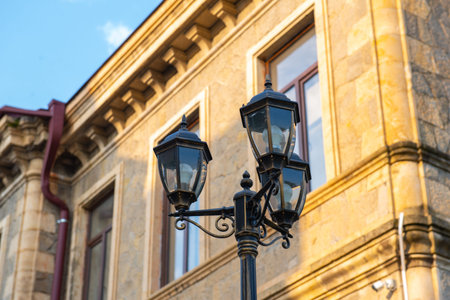 vintage lanterns three-pinned on the streets of georgiaの写真素材