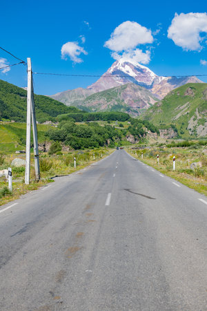Straight asphalt road in Georgia in summerの写真素材