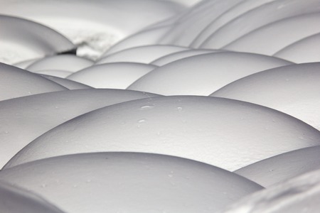 unusual pattern snow snowdrift in the winter forestの写真素材