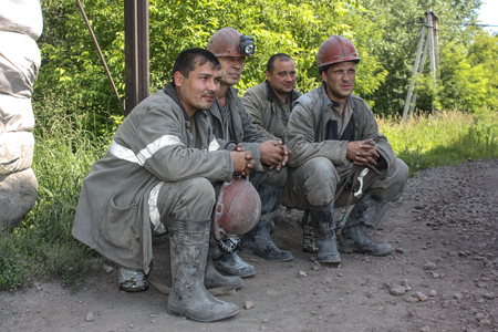 Miners working in anticipation of transport, before sending on changeのeditorial素材