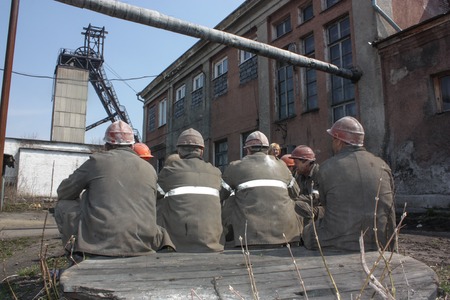 Miners working in anticipation of transport, before sending on changeのeditorial素材