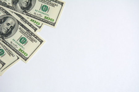 US dollar money cash currency background. American Dollars 100 banknote border in the corner . One...