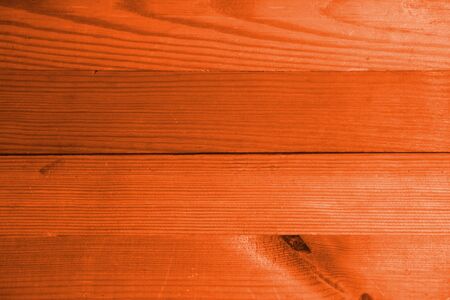 Orange wooden background texture. Old painted wood. Copyspace.の写真素材