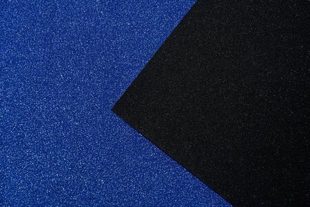 Abstract shiny background blue and black colors. Glitter texture with copy spaceの写真素材