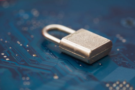 Closed security lock on background blue computer printed circuit board. Cyber Security, virus...