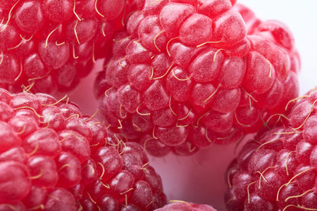 Raspberries macro background texture. Closeup top view. Selective focus