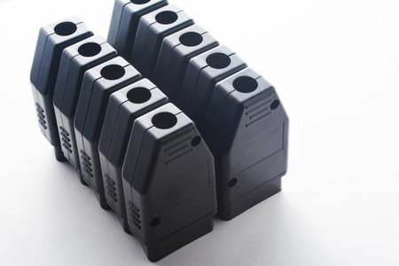 Bunch of OBD2 car scanners and diagnostic interfaces. OBDII professional car scanner. Plug connector...