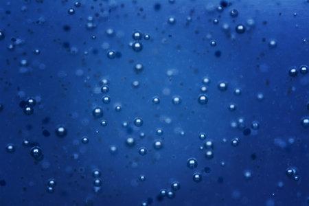 Abstract Blue water bubbles background or texture. Shallow depth of field image