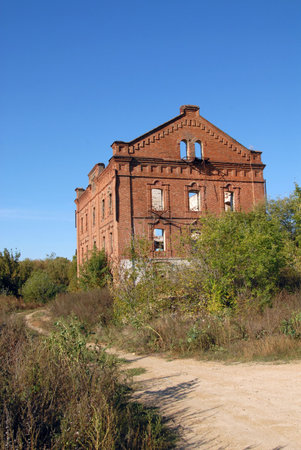Far from cities in steppe there is a destroyed mill.