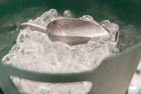 Ice cubes in the bucketの写真素材