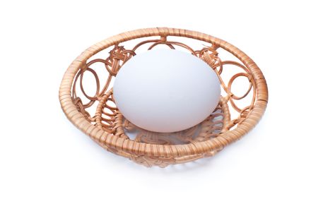 Egg on a tray on a white backgroundの写真素材