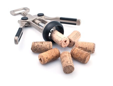 Corks and elegant corkscrew on a white backgroundの写真素材