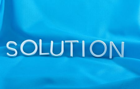 Solution  letters  on  blue backgroundの写真素材