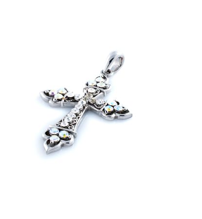 Metallic cross with blue stones isolated on the white.の写真素材