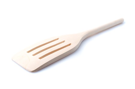 Wooden kitchen shovel on  white backgroundの写真素材