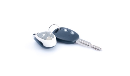 Car key with remote control, isolated over white backgroundの写真素材
