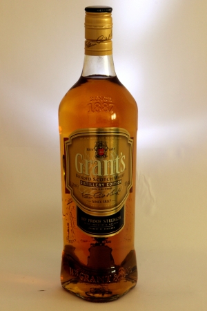 Grants Scotch Whiskey in Backlit White isolated backgroundのeditorial素材