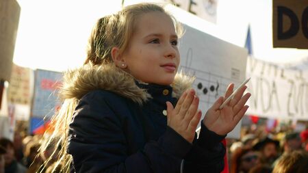 PRAGUE, CZECH REPUBLIC, NOVEMBER 16, 2019: Demonstration of people crowd against Andrej Babis demise, 300,000 mass protesters crowd throng of activists Letna Prague, clapping hands palmsのeditorial素材