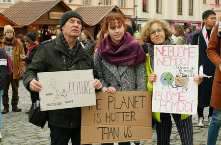 OLOMOUC, CZECH REPUBLIC, NOVEMBER 30, 2019: Activists senior old man and students, Friday for...