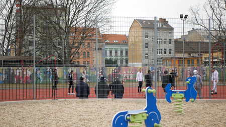 Ghetto poor in Brno, football players field sport field sport pitch, Bratislavska street life people...