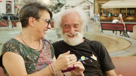 OLOMOUC, CZECH REPUBLIC, AUGUST 9, 2019: Jindrich Streit, a portrait celebrity of a world-renowned documentary photographer, sitting next to friend of the family, authentic photoのeditorial素材