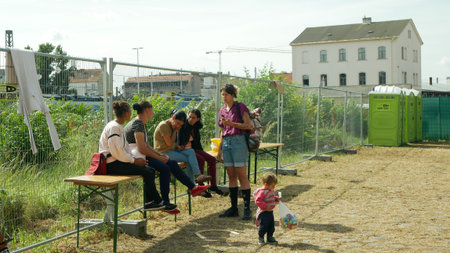 BRNO, CZECH REPUBLIC, JUNE 10, 2022: Refugees Ukraine Gypsy detention camp immigrants, volunteers...