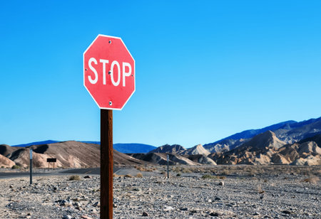 Stop sign in a desolate area