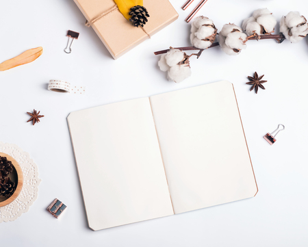 Blank notepad and autumn related items, top viewの写真素材