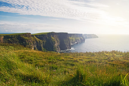 Panorama of beautiful Cliffs of Moher on the sunny dayの写真素材