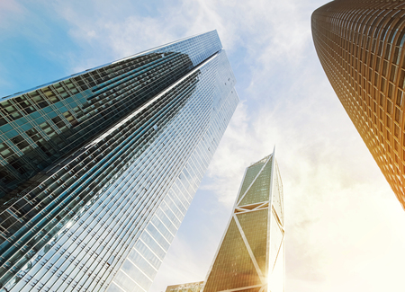 Tall modern skyscrapers on sunny day. View from the ground.の写真素材