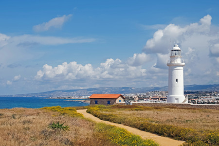 Old lighthouse on the coast at the beautiful dayの写真素材