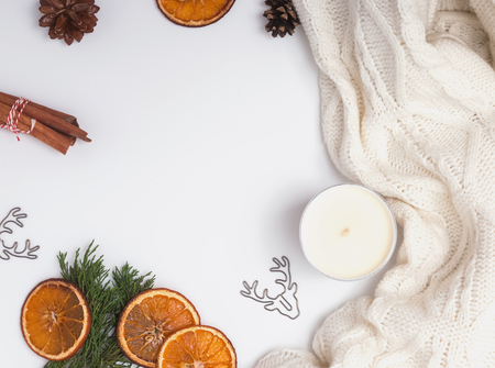 Winter decor and white knitted sweater, top viewの写真素材