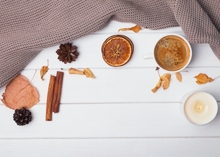 Dry leaves and spices, coffee and warm sweater.の写真素材