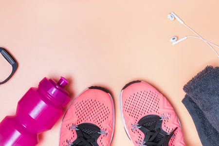 Fitness accessories like sneakers, bottle with water and other.の写真素材