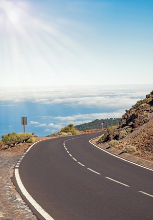 Scenic highway going into the distance over the cloudsの写真素材