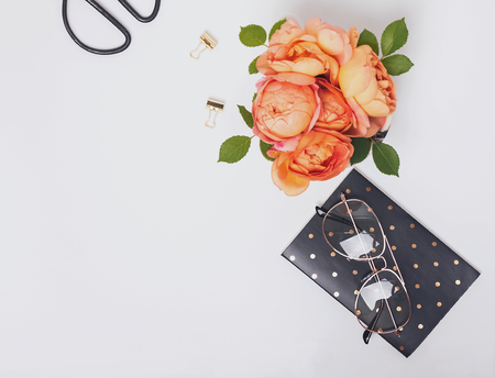 Flowers and glasses on the white backgroundの写真素材