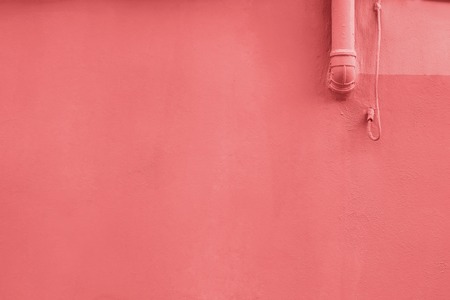 Grungle wall close-up colored in living coral colorの写真素材
