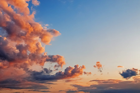 Clouds on the blue sky in sunset light.の写真素材