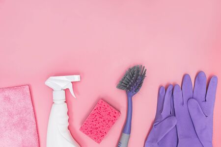 Cleaning tools and supplies on pink backgroundの写真素材