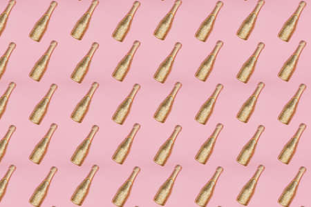 Bottle of champagne decorated with golden glitterの写真素材