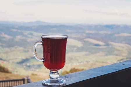 Hot mulled wine, apple cider or other drink close-upの写真素材