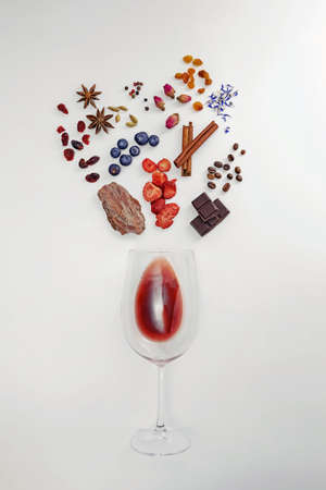 Wine glass and possible flavor components of red wine.の写真素材