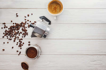 Ingredients for brewing coffee, overhead view on white backgroundの写真素材