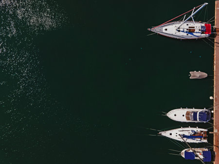 Aerial view of colorful boats in the marine.