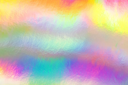 Holographic foil texture, abstract colorful trendy background. Shiny backdrop