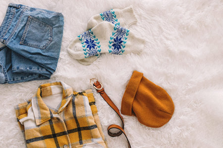 Woman's autumn or winter clothing and accessories, fashion flat lay