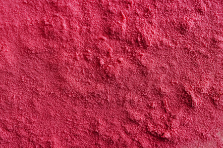 Powder surface close-up, viva magenta color abstract background